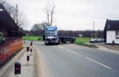 lorry emerging from side road