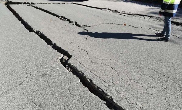 Cracks in the road appeared after an earthquake