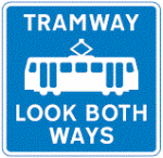 pedestrian-crossing-point-over-tramway-sign