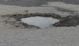 pot-hole-with-puddle