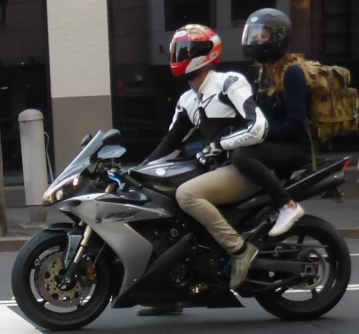 motorbike with pillion passenger