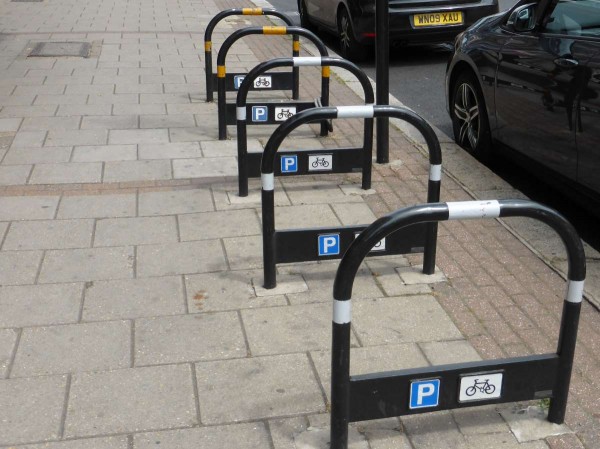 bike racks are sturdy metal structures concreted into the pavement